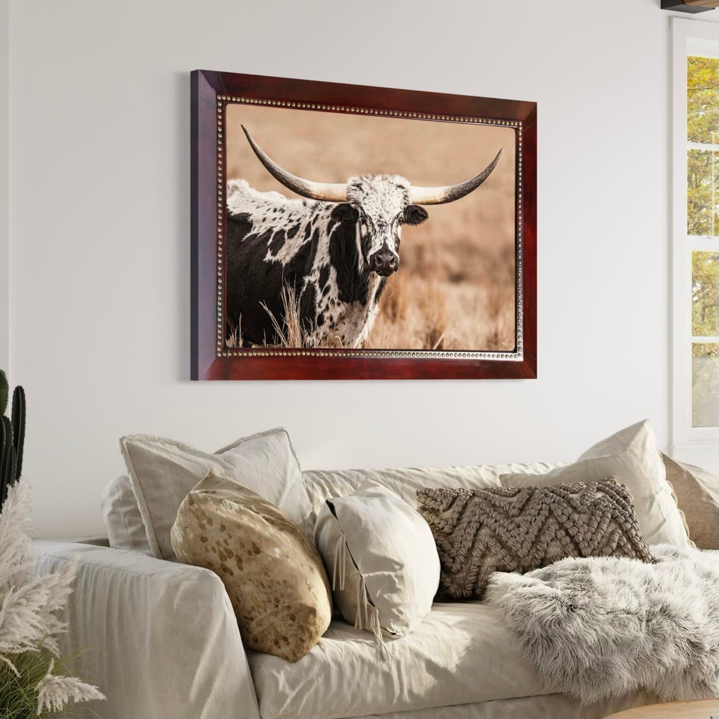 Leather framed longhorn cow photograph